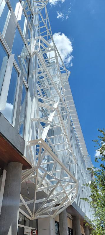 view of TRS offices from below looking up to the blue sky