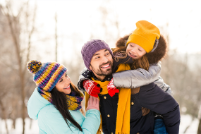young family in cold weather