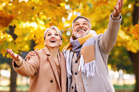 senior couple outdoors in autumn