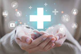 two hands holding heath cross graphic