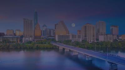 Austin skyline at dusk across the river