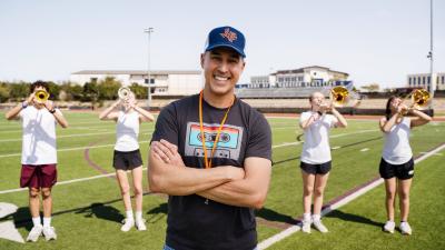 school band director in front of band practice