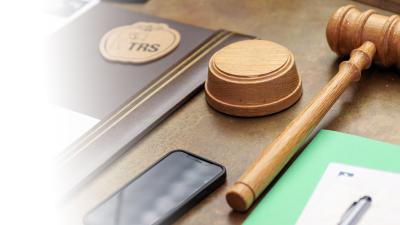 gavel, phone and notepad