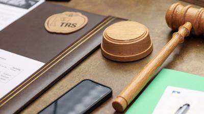 gavel and meeting notes on a desk