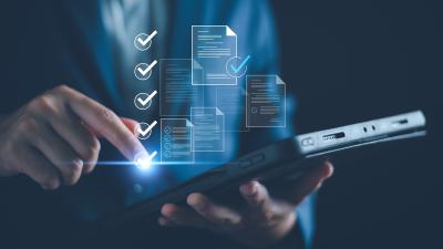 man selects from options on a tablet