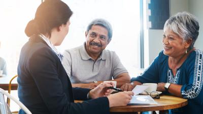 counselor meets with retiree couple