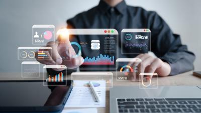 hand points to variety of digital reports