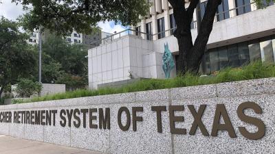 Sign at Red River office that reads Teacher Retirement System of Texas