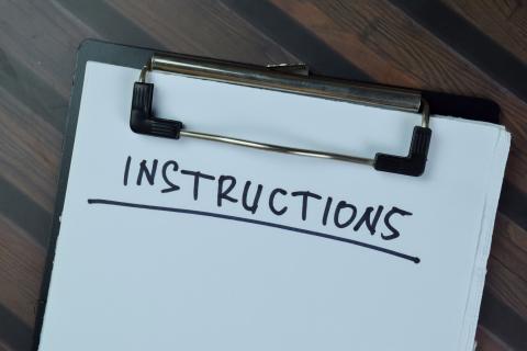 instructions written on a white piece of paper