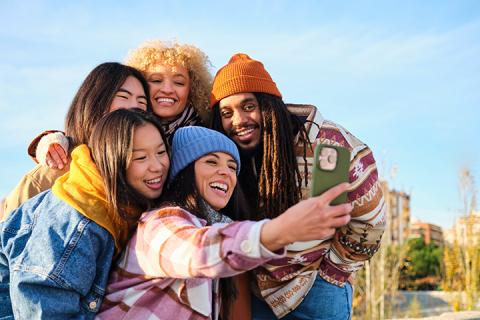 diverse friends taking a selfie