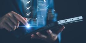 man selects from options on a tablet
