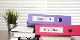 colorful binders for salaries and payroll information