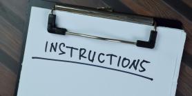 instructions written on a white piece of paper