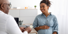 Doctor and patient at prenatal visit