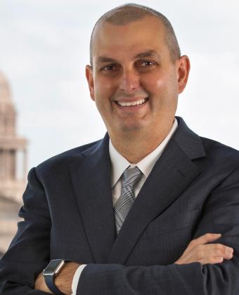 Jase Auby in front of Austin capitol