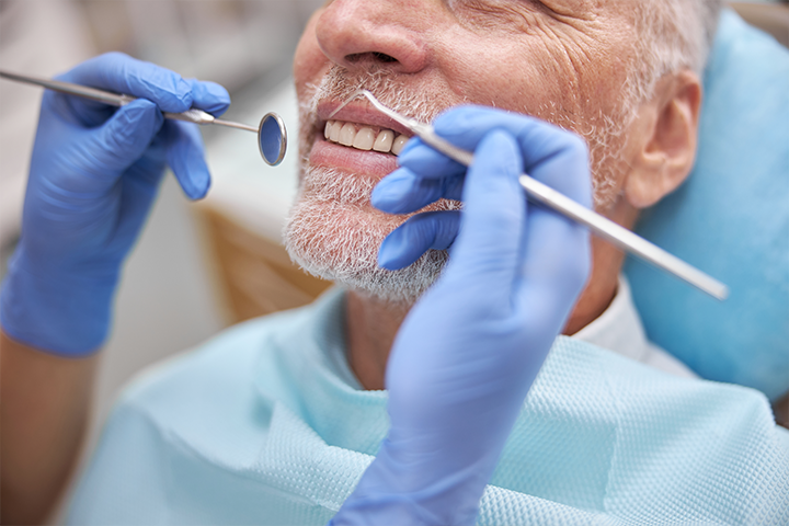 senior adult at dentist
