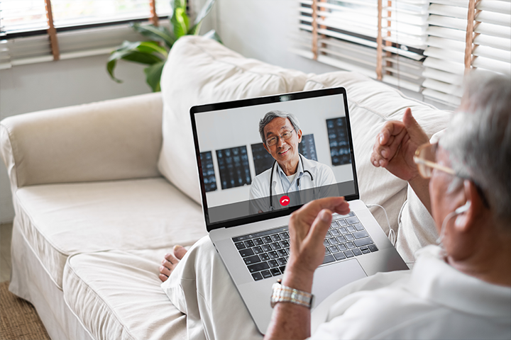 older man using telemedicine