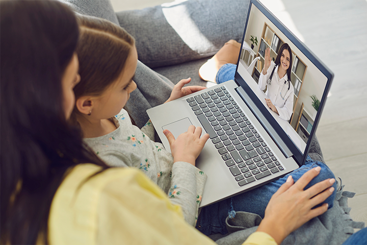 mother and child partaking in virtual care