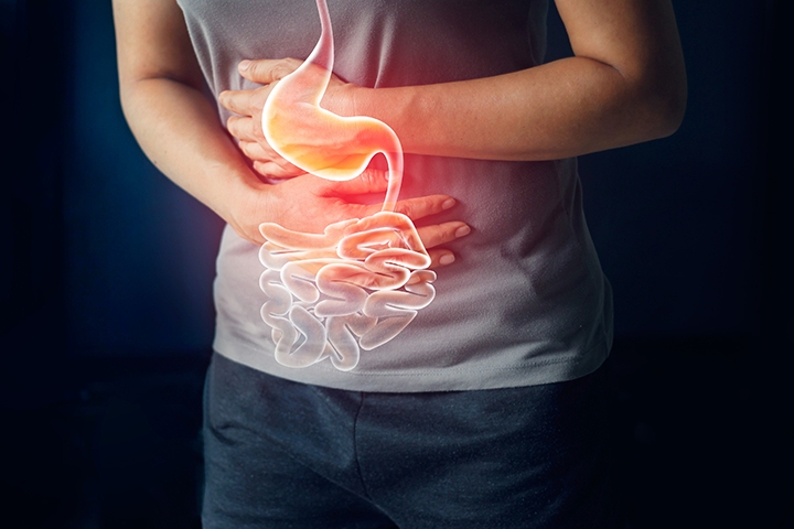 man holding stomach in pain