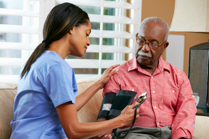man gets blood pressure taken