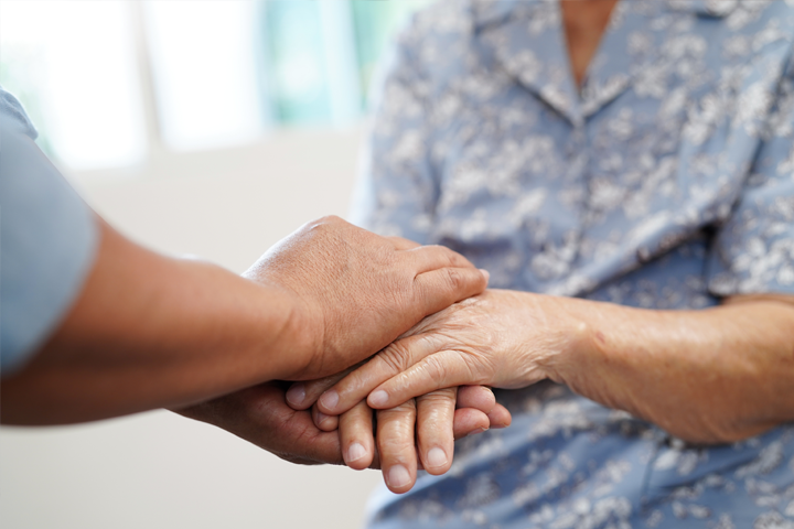 two people holding hands