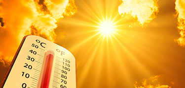 bright sun with thermometer