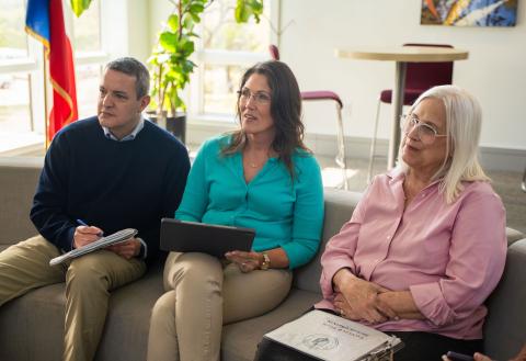 three teachers attend a presentation
