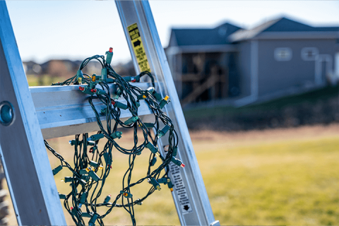 ladder with christmas lights