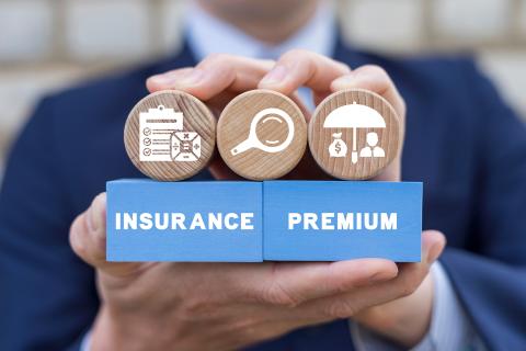 blocks that illustrate health insurance premiums